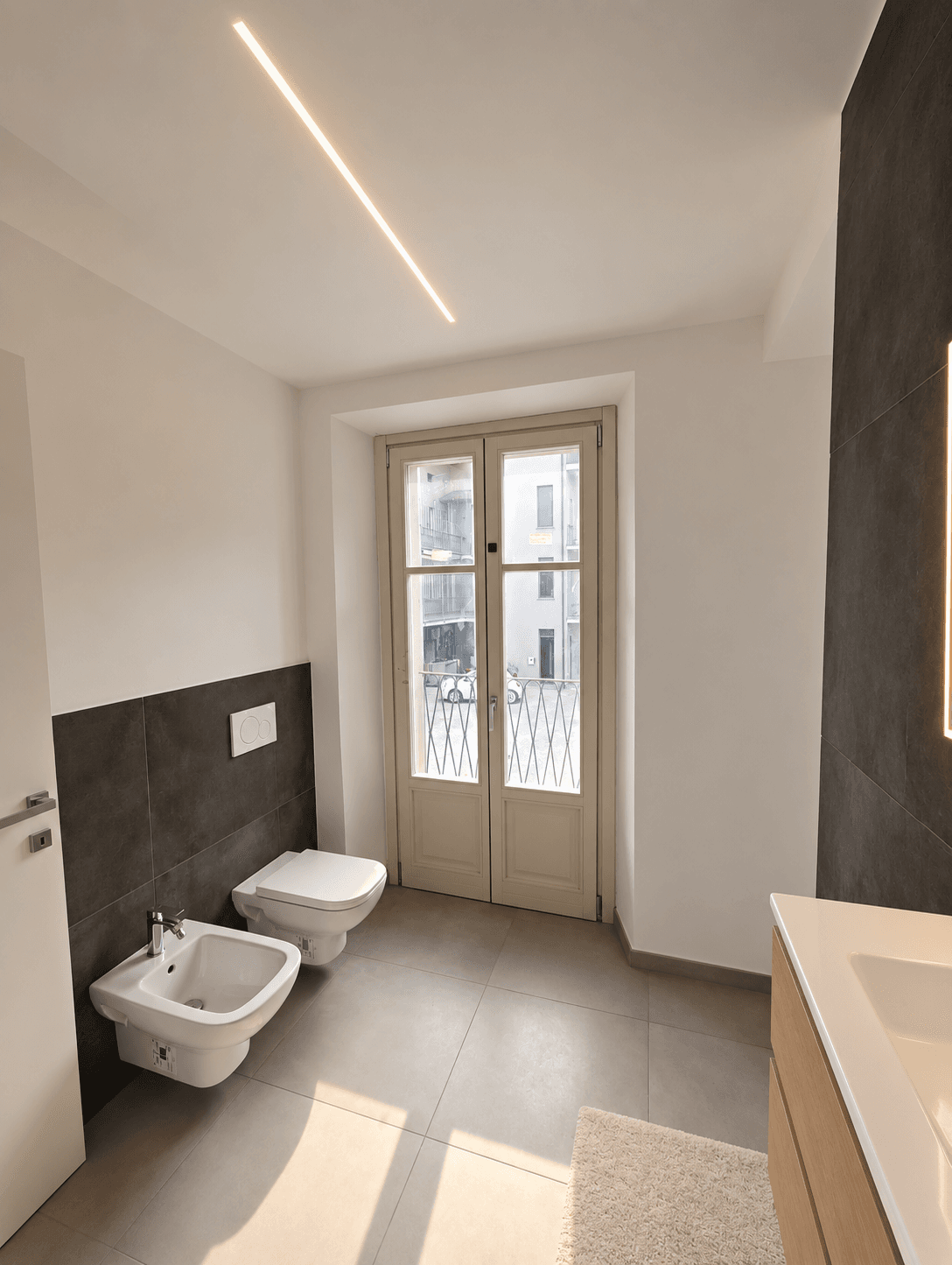 Bagno · verso portafinestra e sanitari · Appartamento n. 10 · ipotesi di completamento