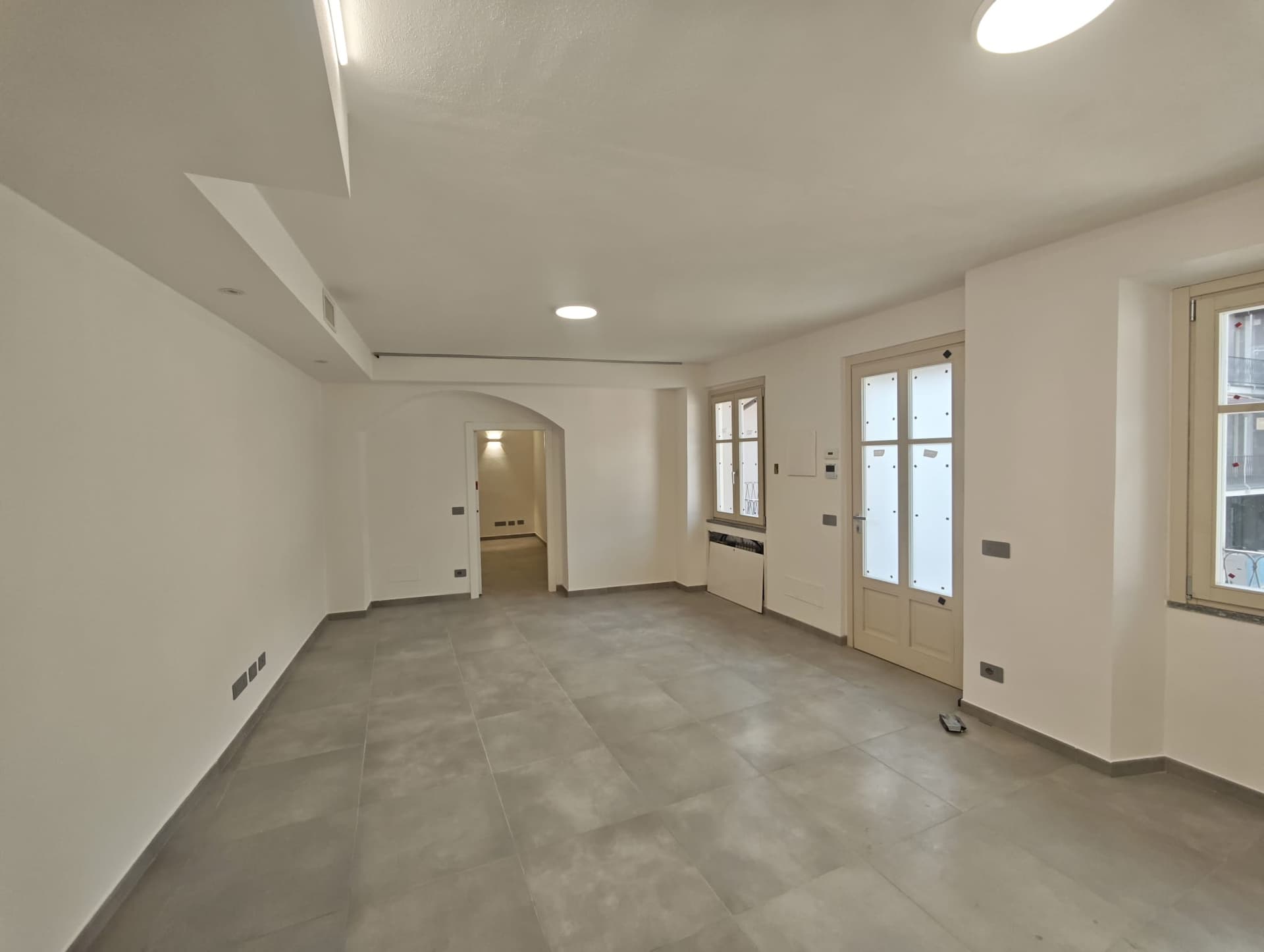 Foto reale della zona giorno dell'appartamento 10