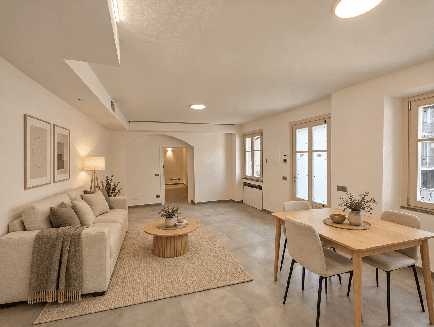 Ipotesi di arredo digitale della zona giorno dell'appartamento 10